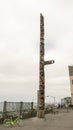 View of a fifty foot cedar totem pole in Victor Steinbrueck Park, Seattle, Washington