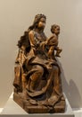 `Virgin and Child`, a German limewood statue with traces of paint, circa 1490, on display in the Cloisters in New York City. Royalty Free Stock Photo