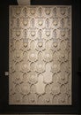 Wall mounted carved relief relic on display in the Hassan II Mosque Museum in Casablanca, Morocco.