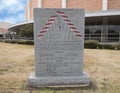 War monument to 112th Calvary Regiment in the Veterans Memorial Garden with Dallas Memorial Auditorium in the background. Royalty Free Stock Photo