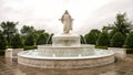 White marble fountain with Jesus Christ standing on top at a church in Southlake, Texas. Royalty Free Stock Photo