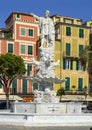 White marble statue of Cristoforo Columbo in a fountain on the promenade in Santa Margherita Ligure, Italy.