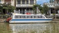 Powerboat tied along the shore of the Thu Bon River, Hoi An, Vietnam Royalty Free Stock Photo