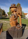 Wooden sculpture water goblin, The Village of Holasovice, Czech Republic Royalty Free Stock Photo