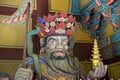 Wooden statue, one of four Great Heavenly Kings often found at Korean temple gates, guardians of the four corners of heaven.