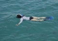 57 year-old Korean female tourist enjoying snorkeling in Santa Maria Bay near San Cabo Lucas