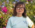 65 year-old Korean matriarch posing for a family photo in Cabo San Lucas.