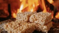 Pictureperfect Rice Krispie treats nestled near the roaring fire their crisp edges and fluffy centers melting in your Royalty Free Stock Photo