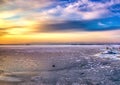 Pictures of a sunset on the frozen Baltic Sea near the Finnish town of Rauma