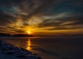 Pictures of a sunset on the frozen Baltic Sea near the Finnish town of Rauma