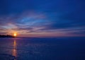 Pictures of a sunset on the frozen Baltic Sea near the Finnish town of Rauma