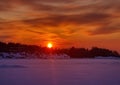Pictures of a sunset on the frozen Baltic Sea near the Finnish town of Rauma
