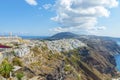 Picturesque aerial panoramic view from the height on the town of Fira and the surrounding area. Santorini island. Royalty Free Stock Photo