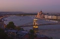 Picturesque aerial sunset cityscape view of Budapest. Illuminated Chain Bridge over Danube river and Parliament Building Royalty Free Stock Photo