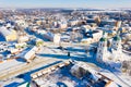 Snow covered Zaraysk cityscape with Trinity Church on sunny day