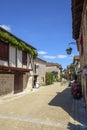 Picturesque architecture in early summer sunshine in Pujols, Lot-et-Garonne, France