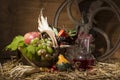 Picturesque autumn composition with basket, fruits, pumpkin, win Royalty Free Stock Photo