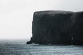 Picturesque autumn Dyrholaey Cape cliffs in fog - Exploring Iceland