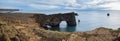 Picturesque autumn evening view to Dyrholaey coast cliffs and rocky arch, Vik, South Iceland. Reynisfjara ocean  black volcanic Royalty Free Stock Photo