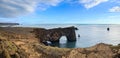 Picturesque autumn evening view to Dyrholaey coast cliffs and rocky arch, Vik, South Iceland. Reynisfjara ocean  black volcanic Royalty Free Stock Photo