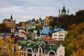 Picturesque autumn landscape of colored roofs of Andrew`s Descent Andriyivsky uzviz, Podil neighborhood Royalty Free Stock Photo