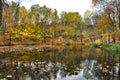 Picturesque autumn landscape of steady river and bright trees Royalty Free Stock Photo