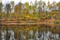 Picturesque autumn landscape of steady river and bright trees Royalty Free Stock Photo