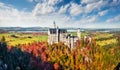 Picturesque autumn panorama of Neuschwanstein Castle Schloss Neuschwanstein in Fussen, Germany. Colorful morning scene in