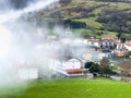 Picturesque Basque village of Aia in the province of Guipuzkoa, Spain shrouded in fog Royalty Free Stock Photo