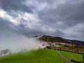 Picturesque Basque village of Aia in the province of Guipuzkoa, Spain shrouded in fog Royalty Free Stock Photo