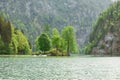 picturesque bavarian lake, koenigssee, bavaria, germany. The landscape of a mountain lake with a small island in the middle.