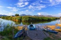 Picturesque bay with moored boats, beautiful blue sea and green trees growing on the hill in the background Royalty Free Stock Photo