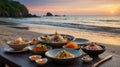 Seafood Feast on a Beach at Sunset: A Culinary Dream Vacation Royalty Free Stock Photo