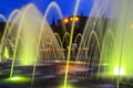 Picturesque, beautiful big colored fountain at night, city Dnepr. Evening view of Dnepropetrovsk, Ukraine. Royalty Free Stock Photo