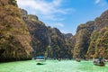 A picturesque beautiful place on the island of Phi Phi Leh - Pi Leh Lagoon is popular for excursions with tourists on traditional