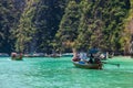 A picturesque beautiful place on the island of Phi Phi Leh - Pi Leh Lagoon is popular for excursions with tourists on traditional