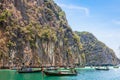 A picturesque beautiful place on the island of Phi Phi Leh - Pi Leh Lagoon is popular for excursions with tourists on traditional