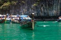 A picturesque beautiful place on the island of Phi Phi Leh - Pi Leh Lagoon is popular for excursions with tourists on traditional