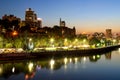 A picturesque beautiful view of modern buildings, skyscrapers, towers of a big city at night. The embankment is Royalty Free Stock Photo