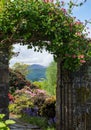 Gateway in the picturesque Bolfracks garden, located in the hills near Aberfeldy, Perthshire, Highlands of Scotland, UK. Royalty Free Stock Photo