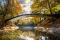 Picturesque bridge across the autumn lake in Almaty Gorky Park, Kazakhstan Royalty Free Stock Photo