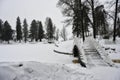 Picturesque bridge in Monrepos park under the snow