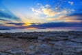 Picturesque bright sunset over blue sea waves in summer evening. Crete Greece