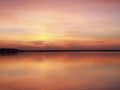 A picturesque bright view of sunset on a river. A scenery of a c