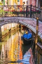 Picturesque canal with a gondola, Venice, Italy Royalty Free Stock Photo