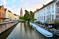 Late day view of the canals of Bruges, Belgium with reflections Royalty Free Stock Photo