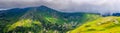 Picturesque Carpathian mountains landscape in summer, wide angle panoramic view, Ukraine. Royalty Free Stock Photo