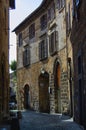 old building facade on a narrow lane in Orvieto