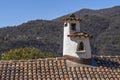 Picturesque chimney on the roof of a house in swiss village Morcote