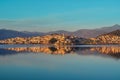 The picturesque city of Kastoria reflected on the lake of Orestiada. Royalty Free Stock Photo